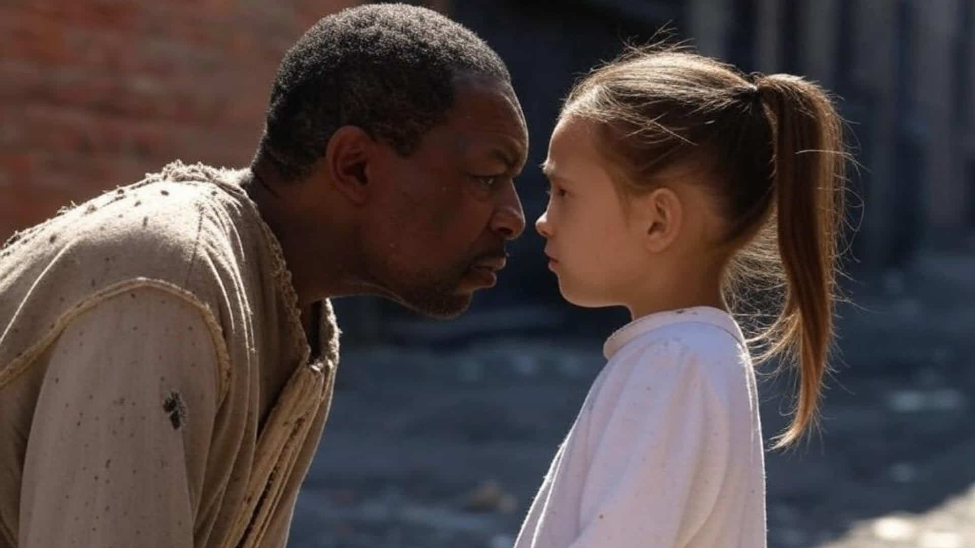 imagen de inteligencia artificial de un subsahariano mirando una niña imagen de inteligencia artificial de un subsahariano mirando una niña